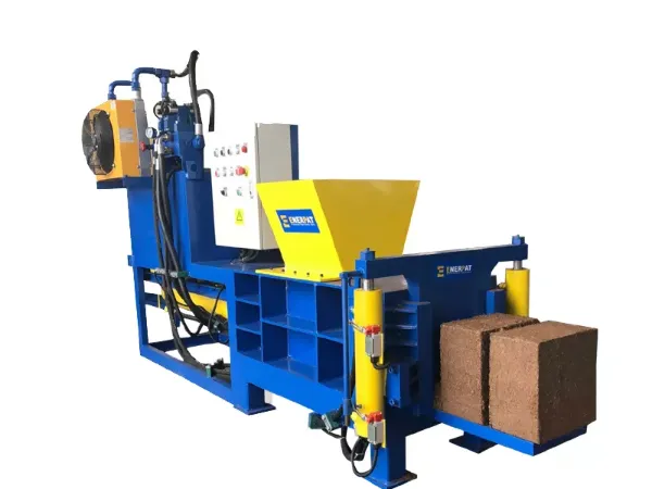 Hydraulic press compressing coco pith into blocks